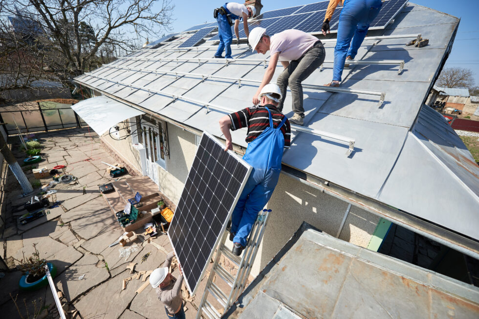 bigstock-Male-Team-Workers-Installing-S-291484405-980x654-1