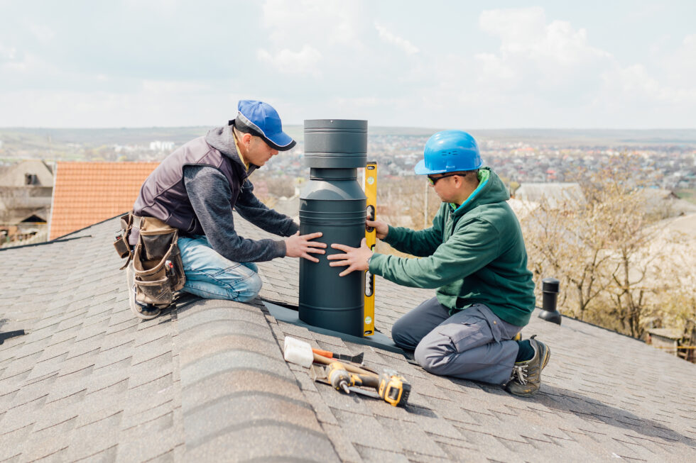 bigstock-Workers-On-The-Roof-Installing-421050344-980x653-1